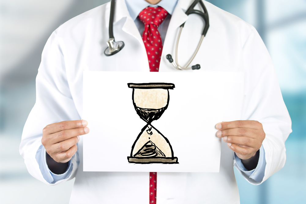 Dr with hour glass